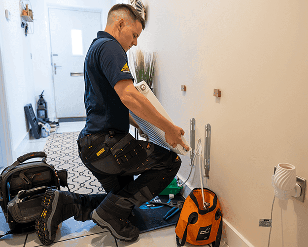 Professional engineer working on boiler repair